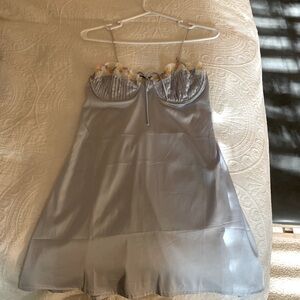 Light blue mini dress. Has lace with floral. size small